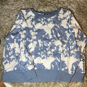 Blue and white Reebok crewneck.